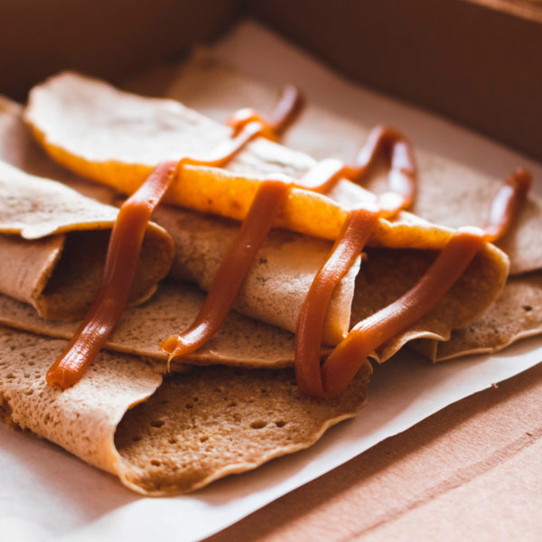 closeup-shot-of-delicious-crepes-covered-with-caramel